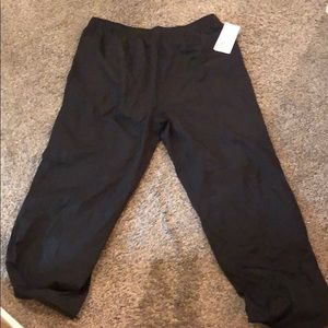 Black golf windbreaker pants